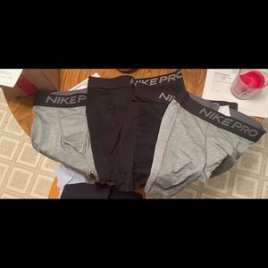Nike mens size medium compression shorts four pack